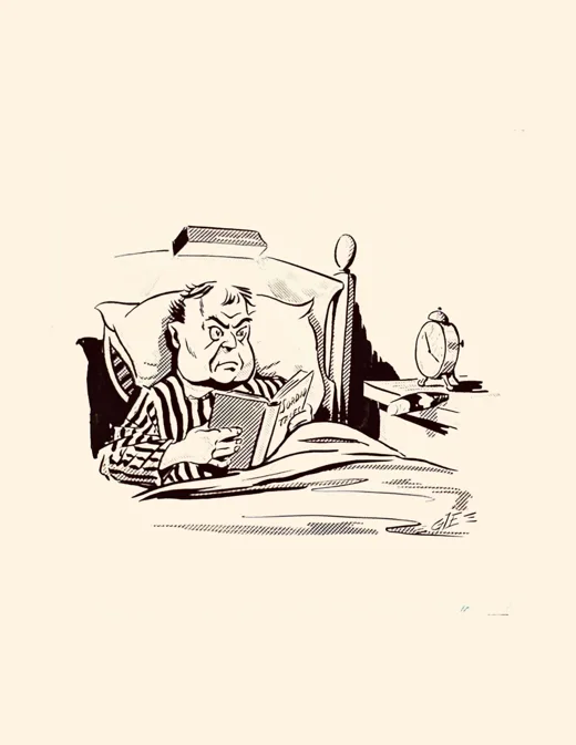 Man reading in bed